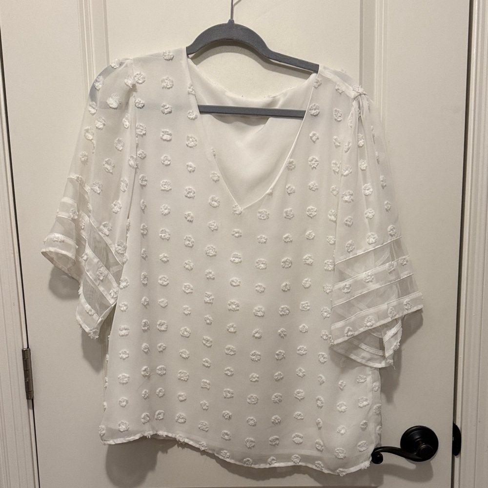 Chic White Blouse with Floral Accents